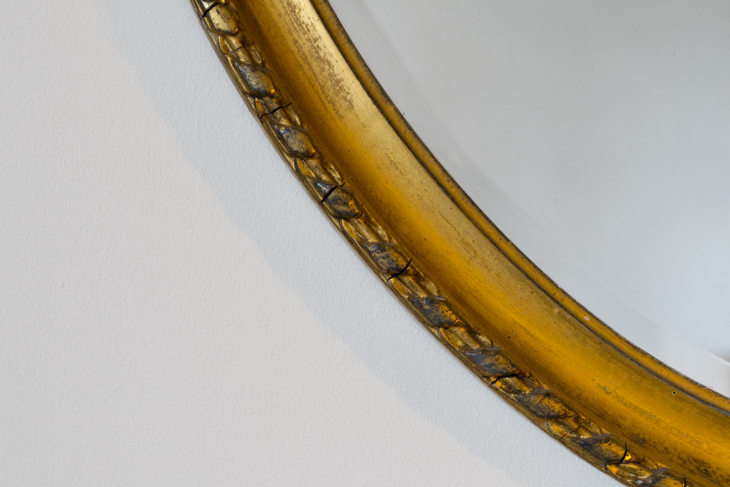 OVAL GILTWOOD MIRROR, C.1930