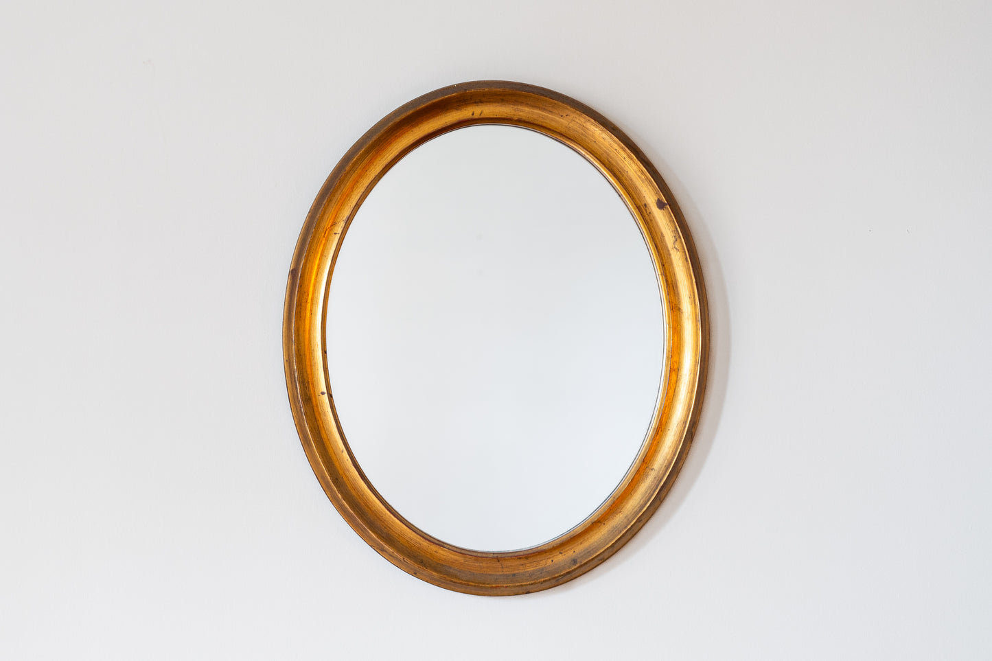 SMALL OVAL GILTWOOD MIRROR, C.1960