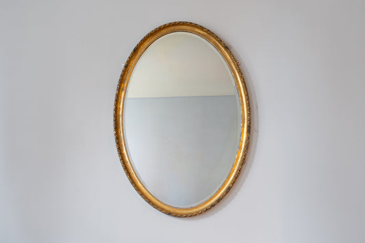 OVAL GILTWOOD MIRROR, C.1930